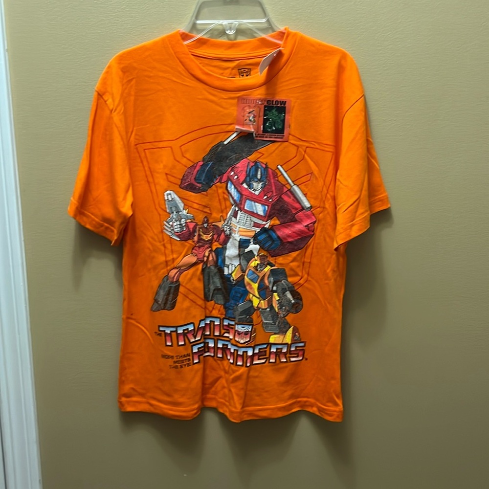 ❗️NWT❗️Orange transformers T-shirt size medium Optimus prime glow-in-the-dark